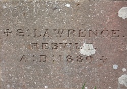 Engraved stone commemorating the rebuilding of St Lawrence Church